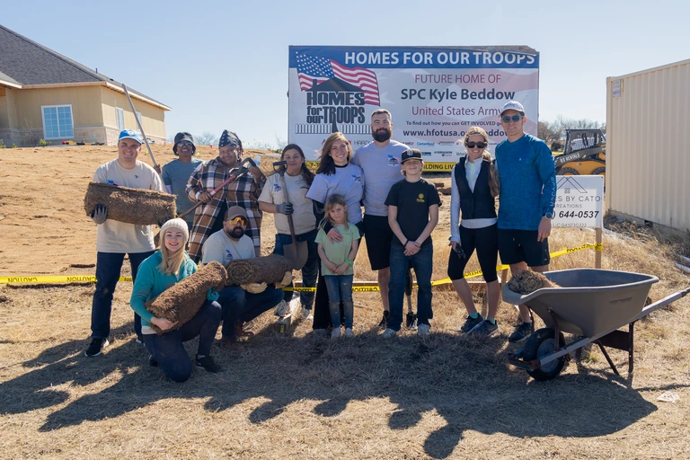 Populus Financial Group volunteer team at HFOT build site.